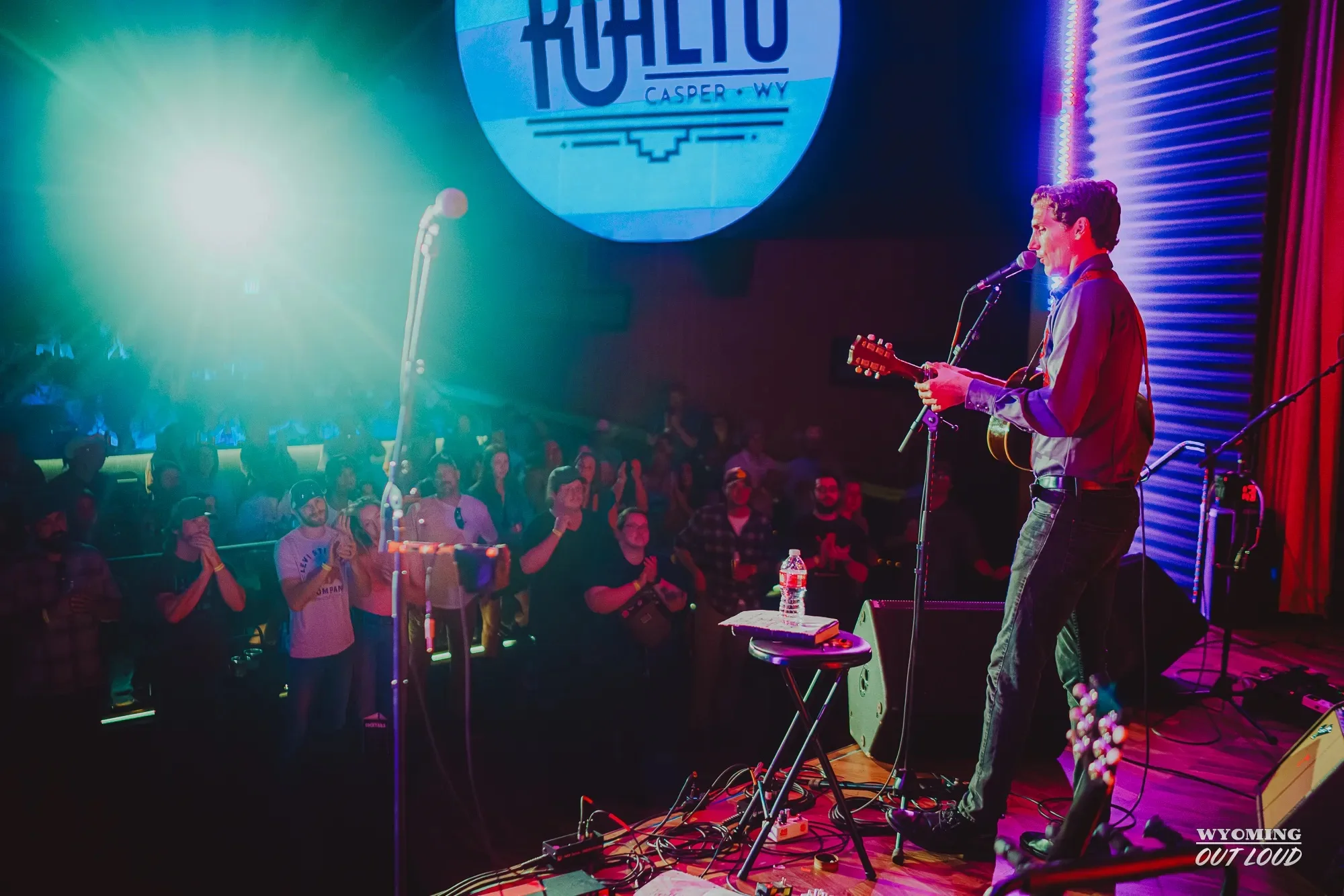 Singer facing the audience at The Rialto